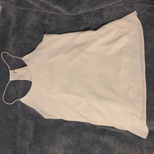 Bone color sleeveless blouse
